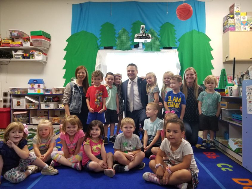 Representative Aaron Bernstine with children at McKay Education Center's pre-k classroom in Slippery Rock.