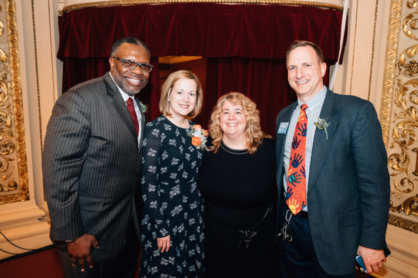 Image: Trying Together Executive Director Cara Ciminillo smiles together with others at Trying Together's 2019 Annual Celebration Dinner.