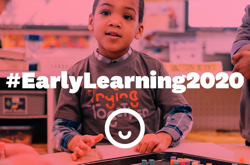 Image: A young child looks at the camera while playing with toys, the hashtag #EarlyLearning2020 featured prominently on the image.