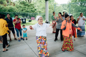 Parent or caregiver dancing in the middle of a crowd | caring for yourself