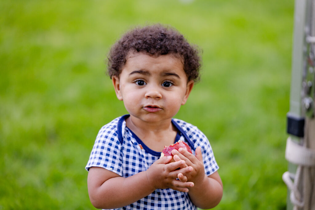 Toddler eating an apple | Food Insecurity in Allegheny County