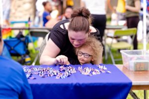 Caregiver and child exploring activity together | Harvard University Center Releases New Science X Design Learning Toolkit