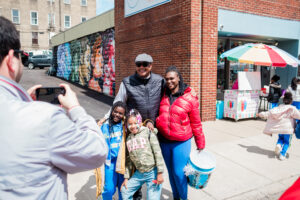 Mayor Gainey standing with community members for photo | Pittsburgh Seeks Feedback on Residents’ Use of EngagePGH Platform